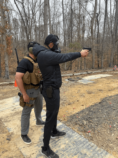 Certified trainers conducting hands-on readiness instruction with professional clients